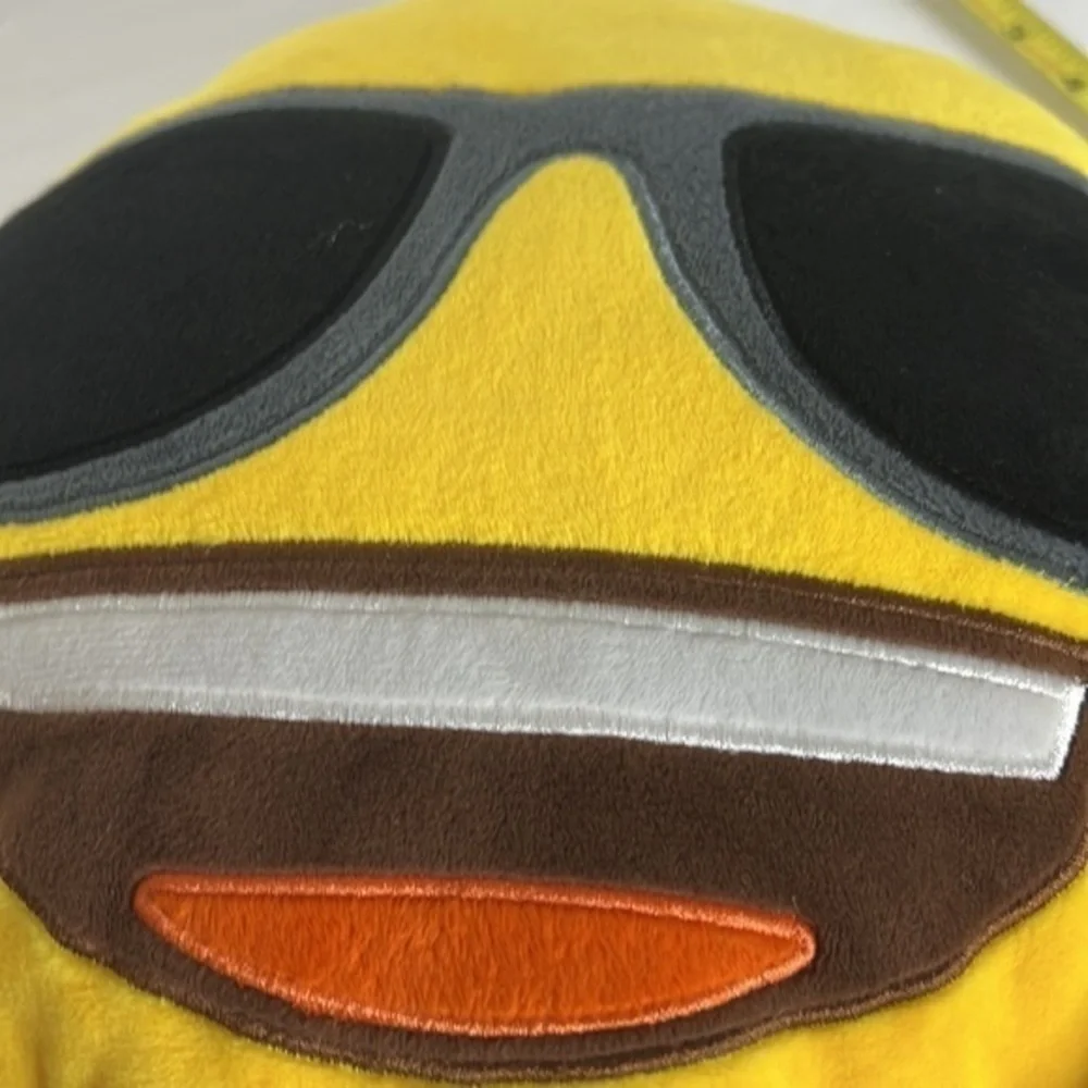 THE ICONIC BRAND EMOJI SMILE PILLOW WITH SUNGLASSES